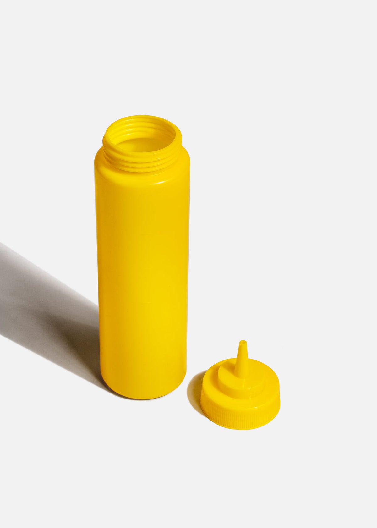 Botella de plástico amarillo dispensadora para aderezo 709 ml — imagen de producto