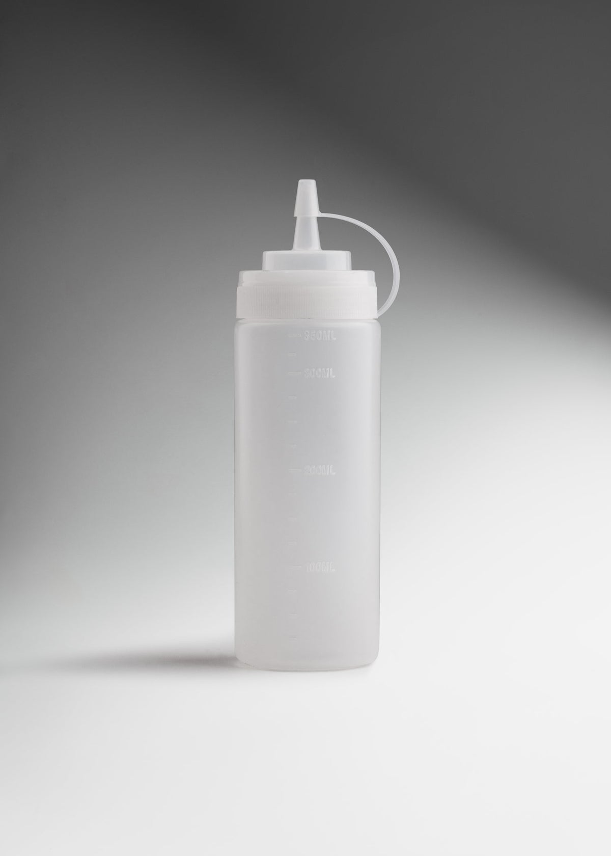 Botella dispensadora de plástico (polietileno) transparente 12 oz