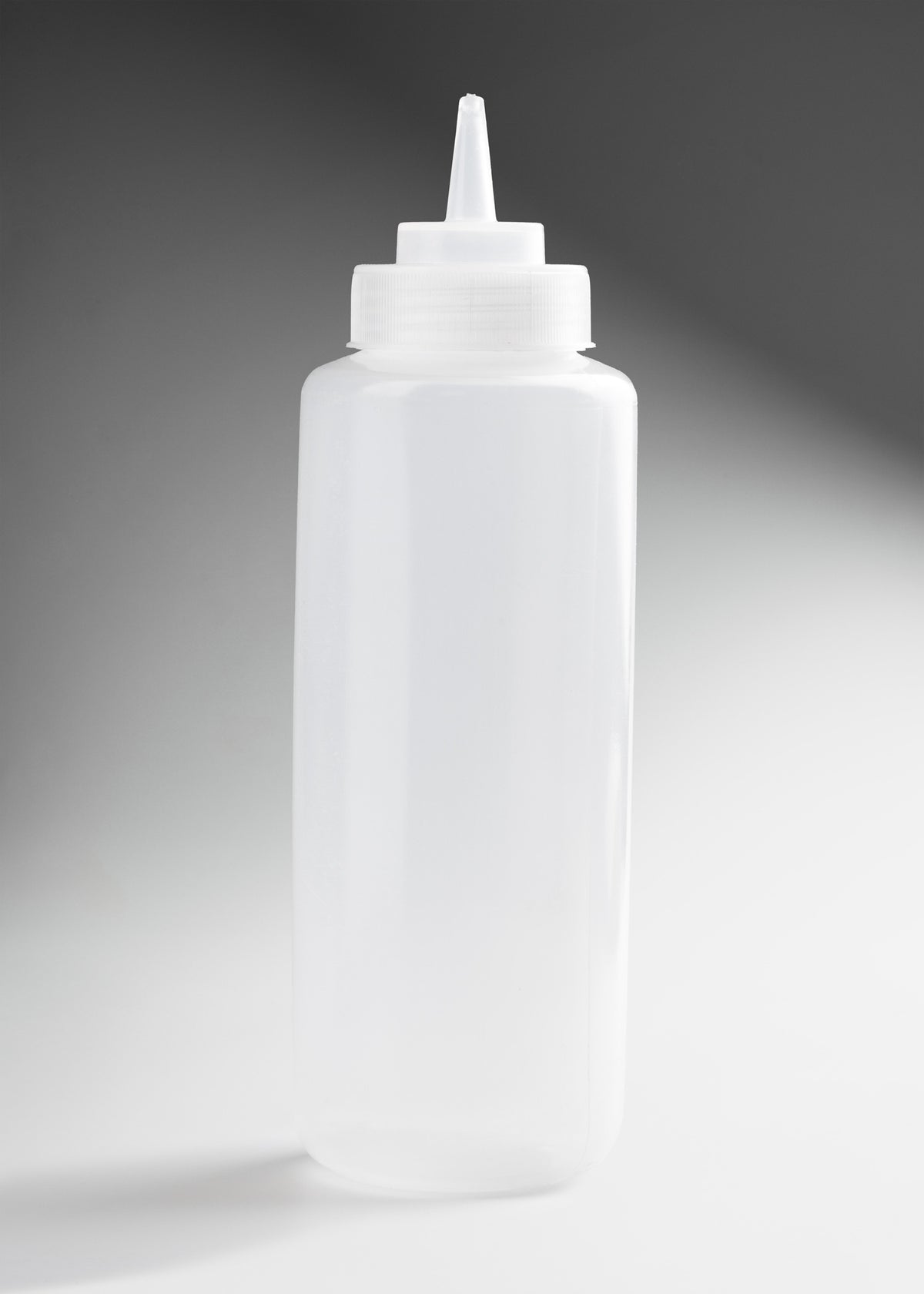 Botella dispensadora para aderezos de plástico transparente Squeeze Pro 32 oz — imagen de producto