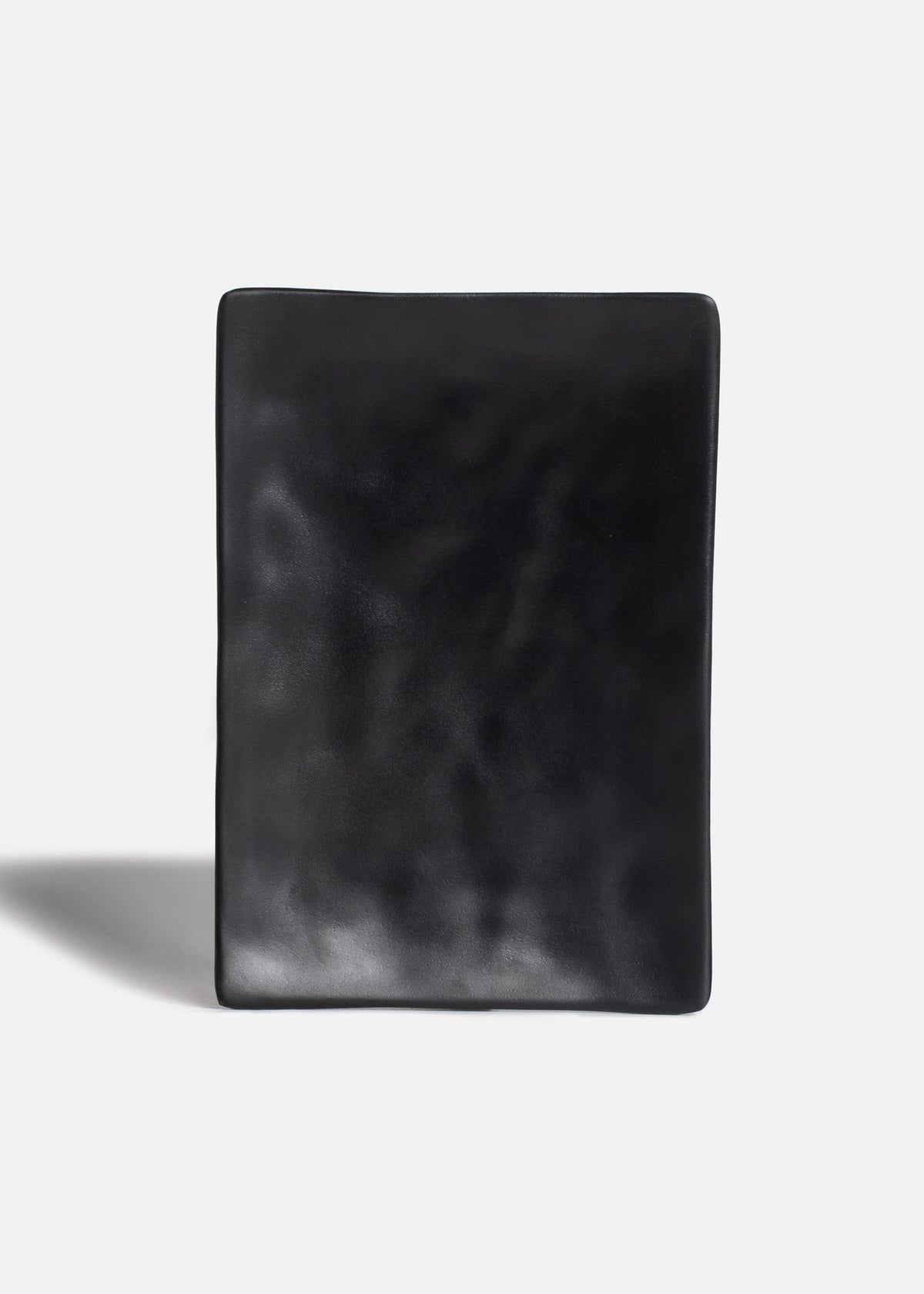 Plato rectangular de melamina negro mate con textura 20x13.7x 2 cm — imagen de producto