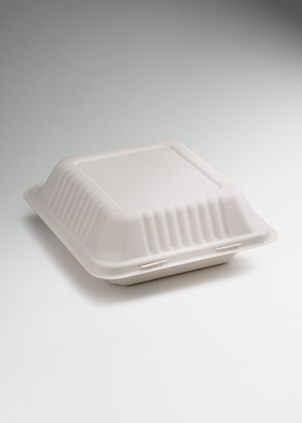 Contenedor para alimentos cuadrado de bagazo de caña blanco Clamshell 20x20 cm — imagen de producto