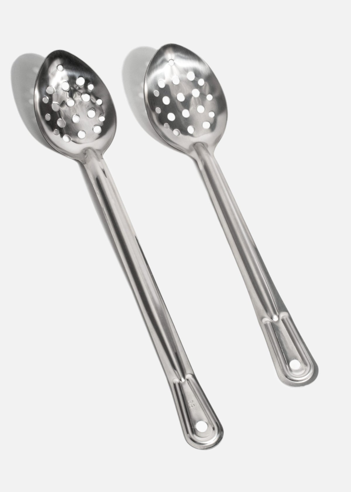 Cucharas de cocina perforadas de acero inoxidable plata — imagen de producto