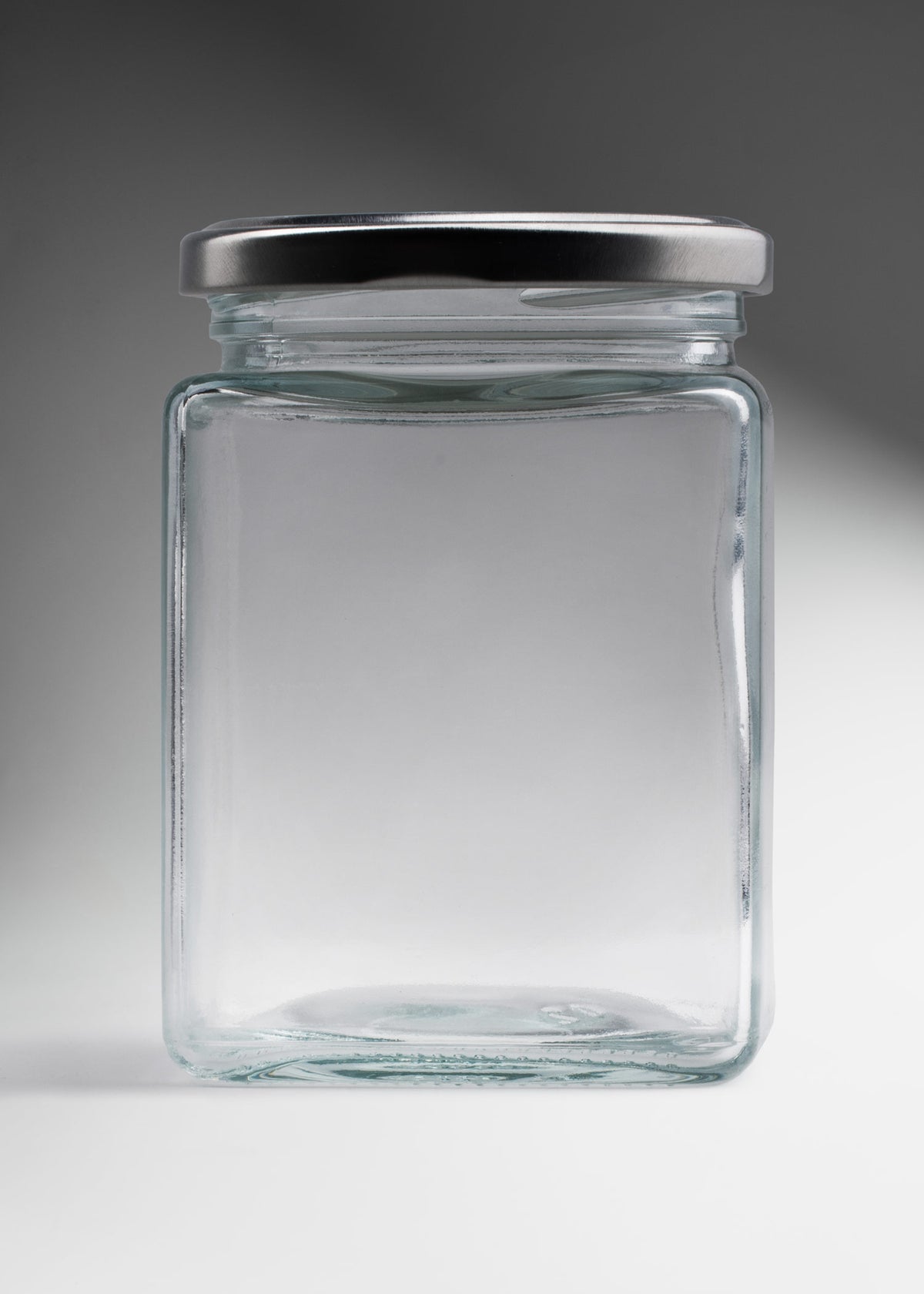 Frasco cuadrado de vidrio transparente con tapa de rosca plata premium para miel, mermeladas, especias, dulces y productos gourmet 380 ml — imagen de producto