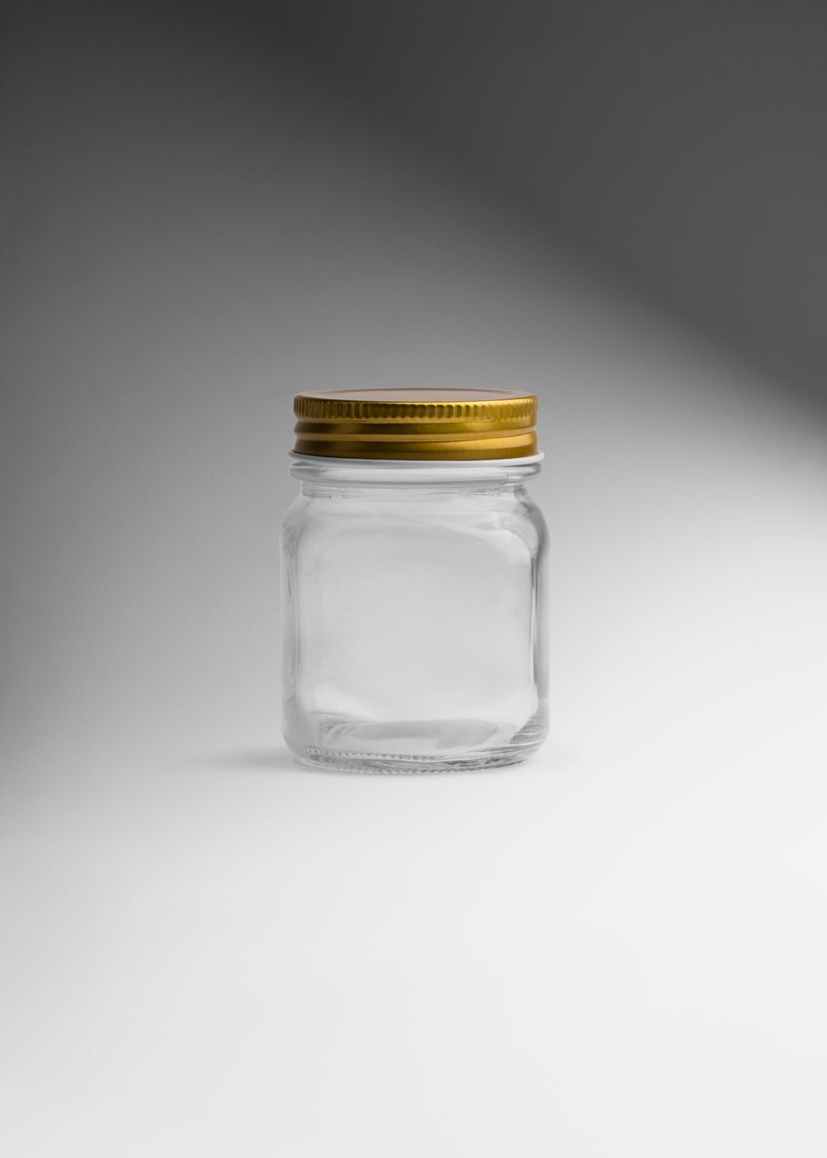 Frascos cilindro de vidrio transparente con tapa dorada de 150 ml a 1 L — imagen de producto