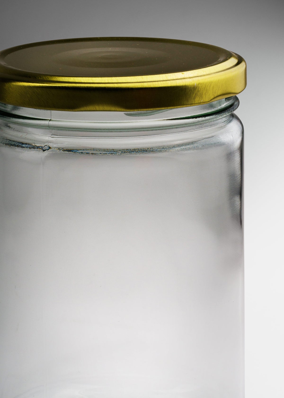 Frascos cilindro de vidrio transparente con tapa dorada de 50 a 500 ml — imagen de producto