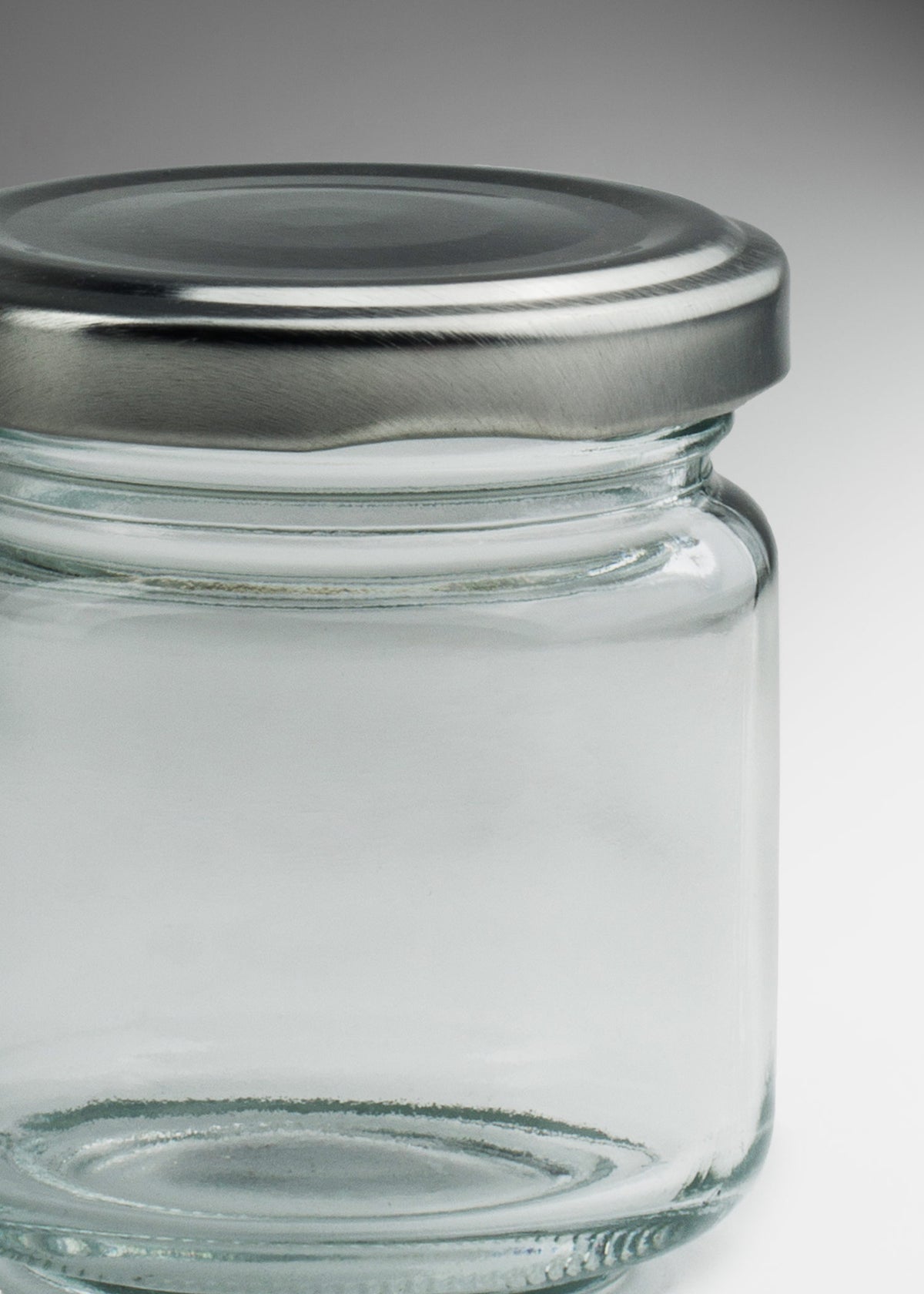 Frascos cilindro de vidrio transparente con tapa plateada de 50 a 500 ml — imagen de producto