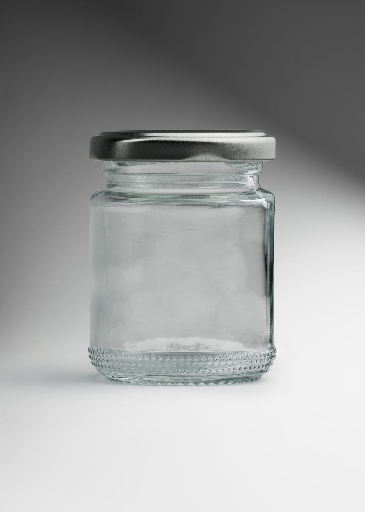 Frascos cilindro de vidrio transparente con tapa plateada de 50 a 500 ml — imagen de producto