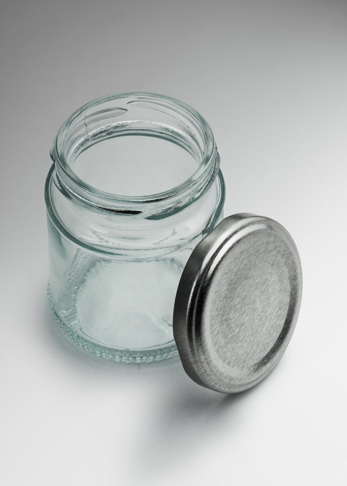 Frascos cilindro de vidrio transparente con tapa plateada de 50 a 500 ml — imagen de producto
