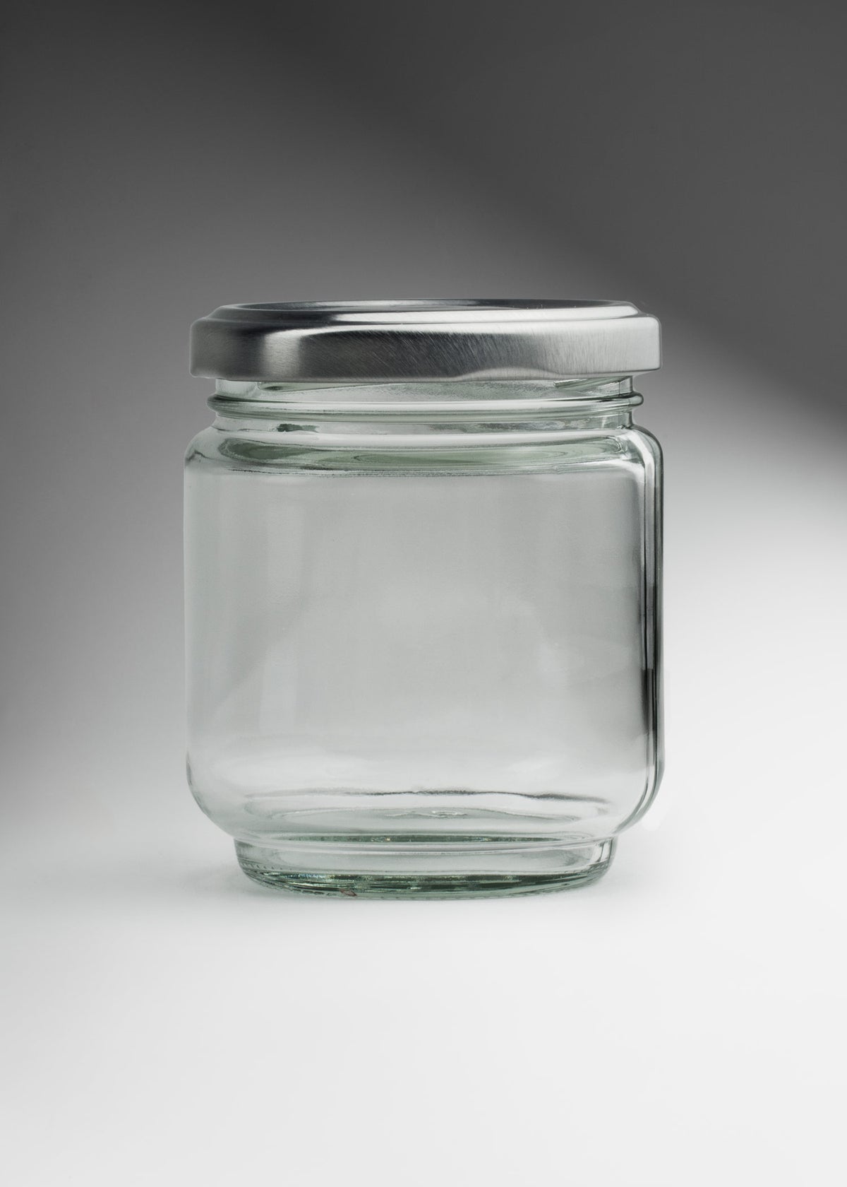 Frascos cilindro de vidrio transparente con tapa plateada de 50 a 500 ml — imagen de producto