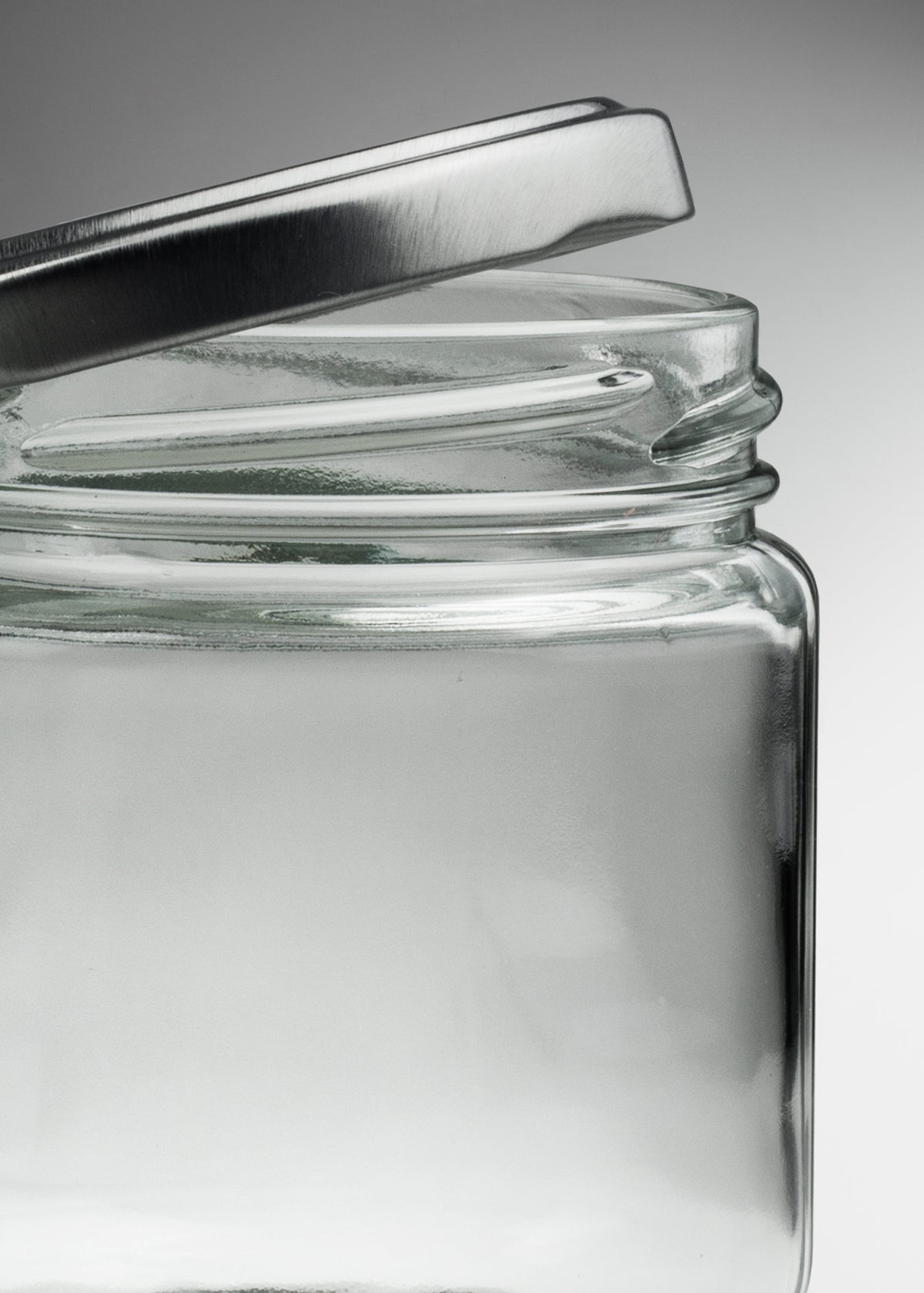 Frascos cilindro de vidrio transparente con tapa plateada de 50 a 500 ml — imagen de producto