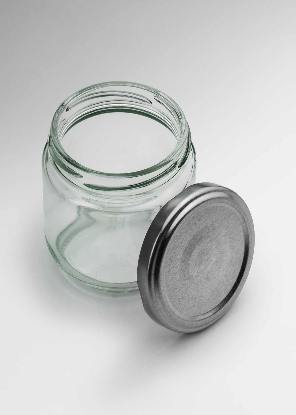 Frascos cilindro de vidrio transparente con tapa plateada de 50 a 500 ml — imagen de producto
