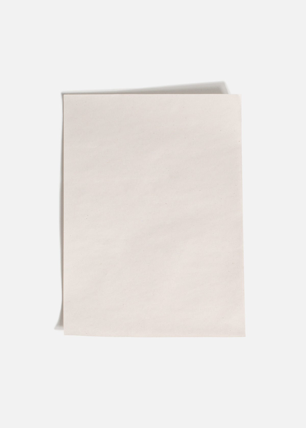 Papel encerado gris grado alimenticio para tacos 13.5x19 cm. Paquete de 5 kg — imagen de producto