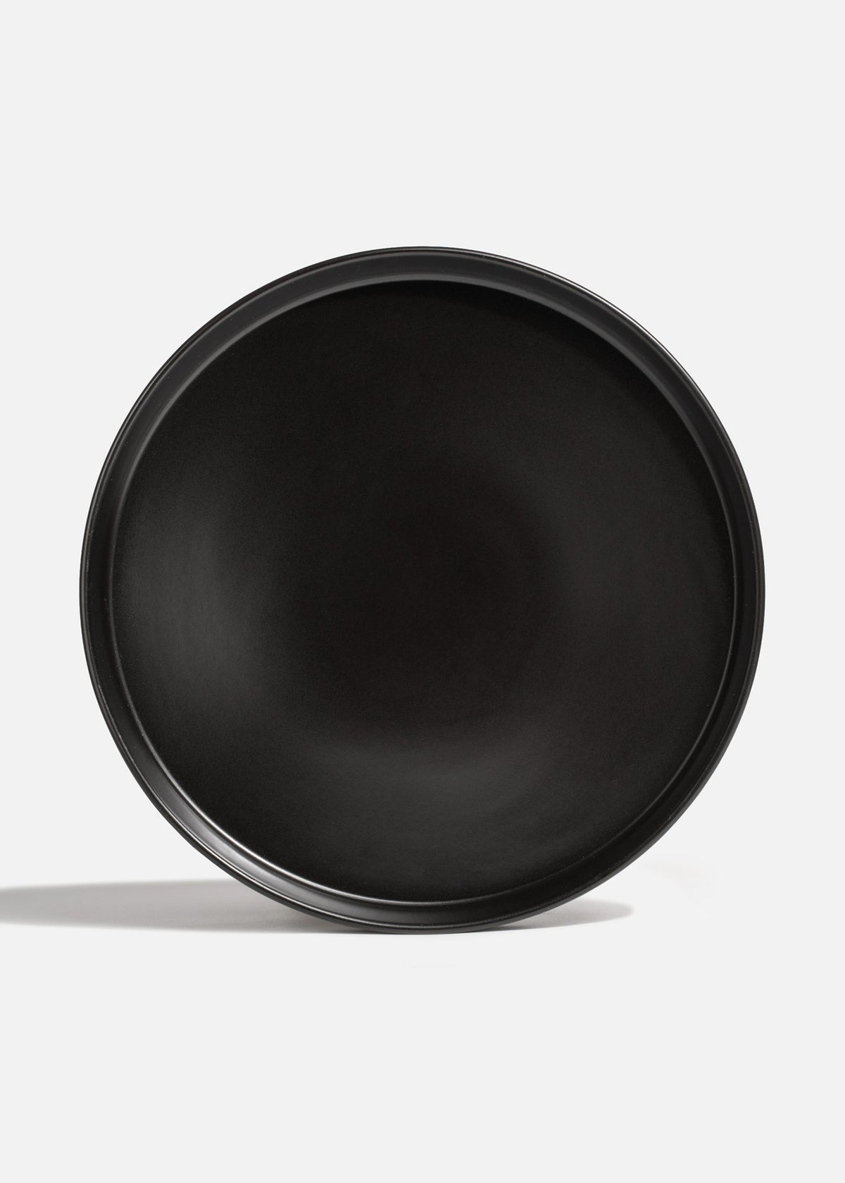 Plato trinche con borde elevado de cerámica premium negro esmalte mate profesional para restaurante y cafeterías Stone Lain Ø 27 cm — imagen de producto