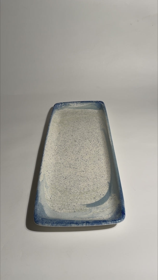 Video de la charola rectangular de porcelana Harena Moove 48 × 16 cm