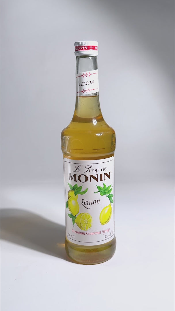 Cargar vídeo: Jarabe de limón botella de vidrio Monin 750 ml — video de producto