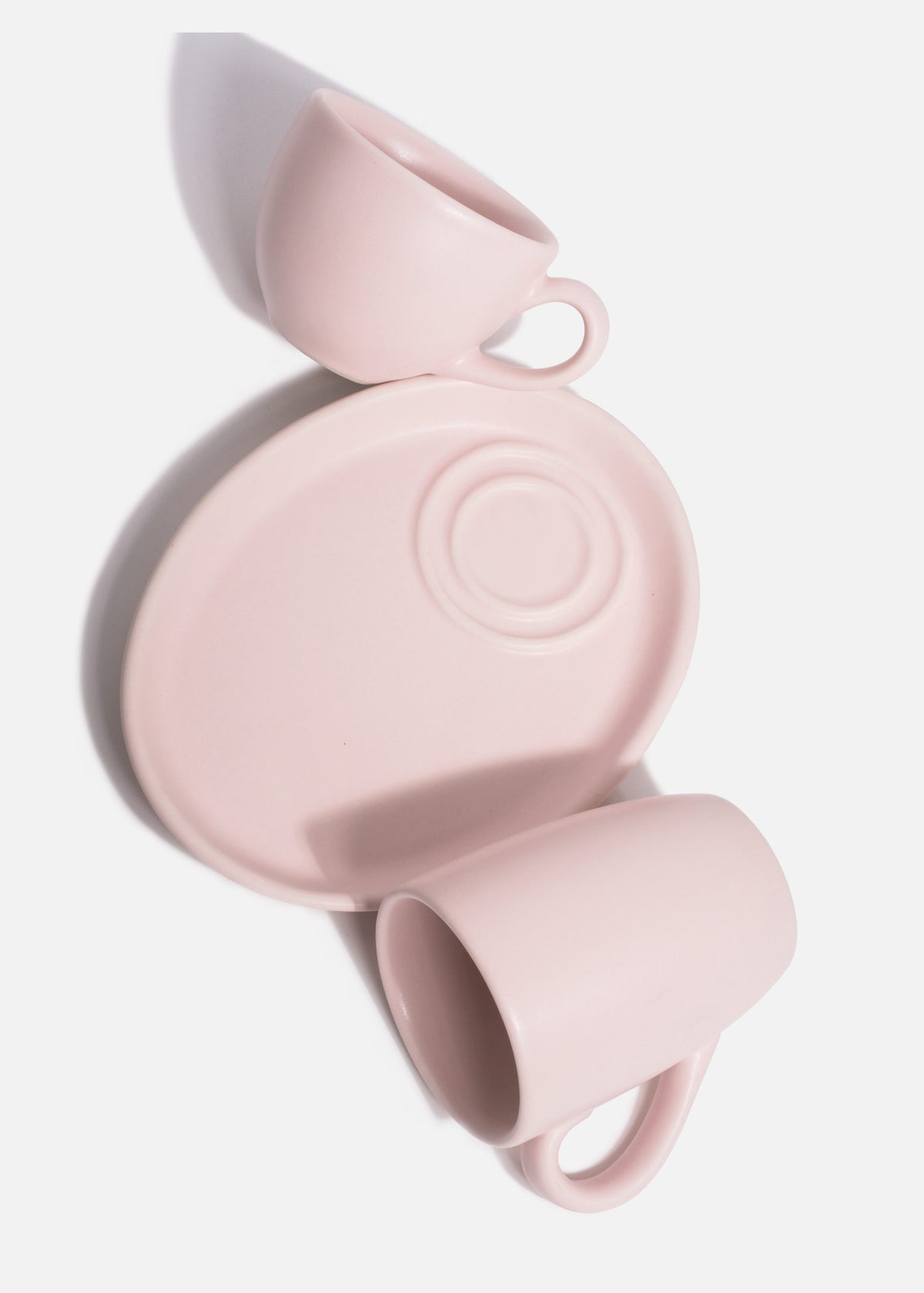 Tazas de porcelana rosa pastel — imagen de producto