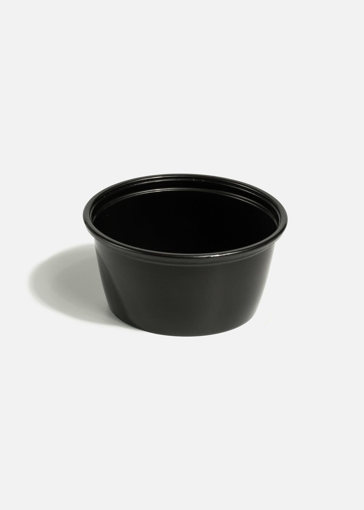 Vaso de plástico / polipropileno negro Souffle 59 ml / 2 oz — imagen de producto