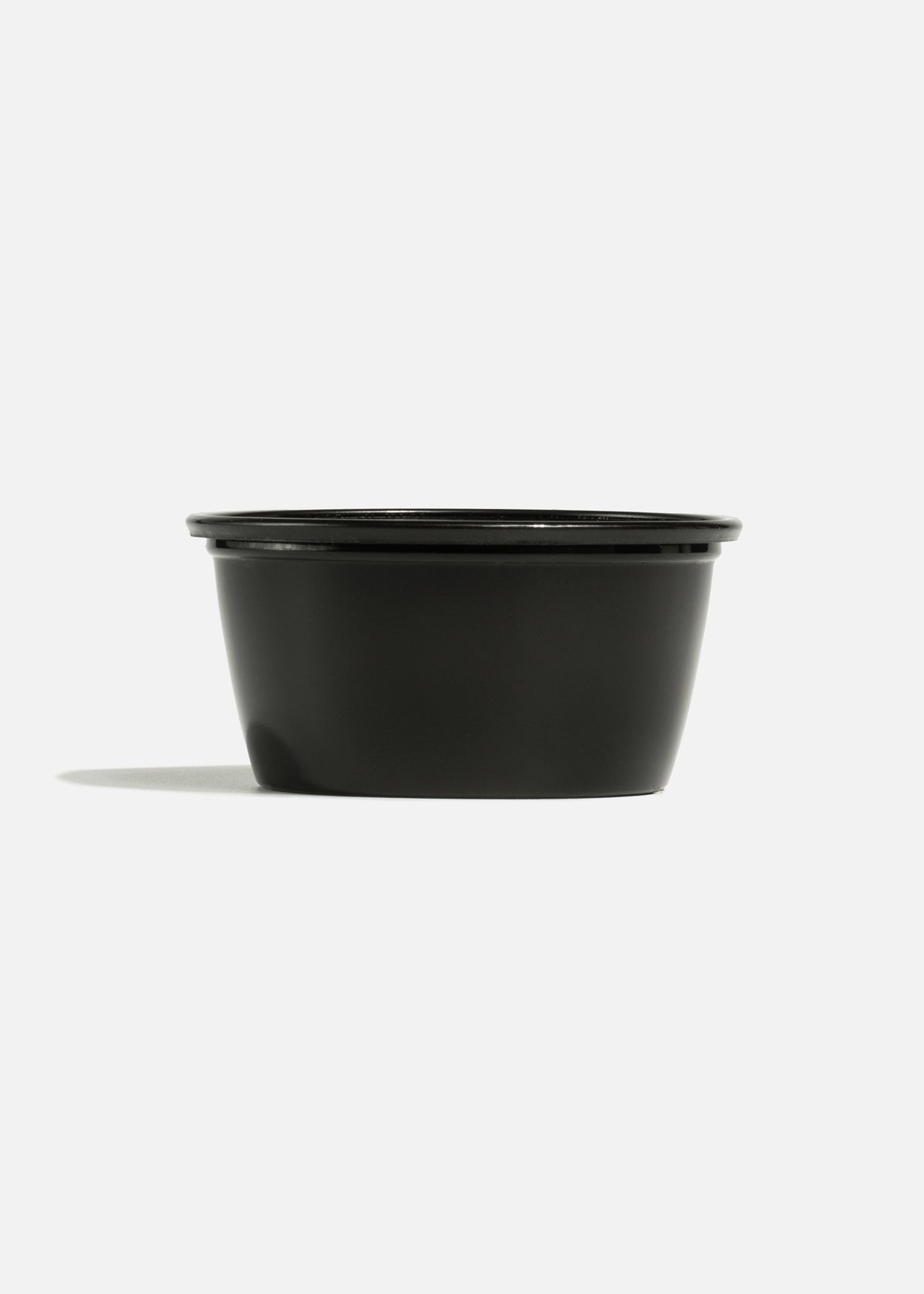 Vaso de plástico / polipropileno negro Souffle 59 ml / 2 oz — imagen de producto