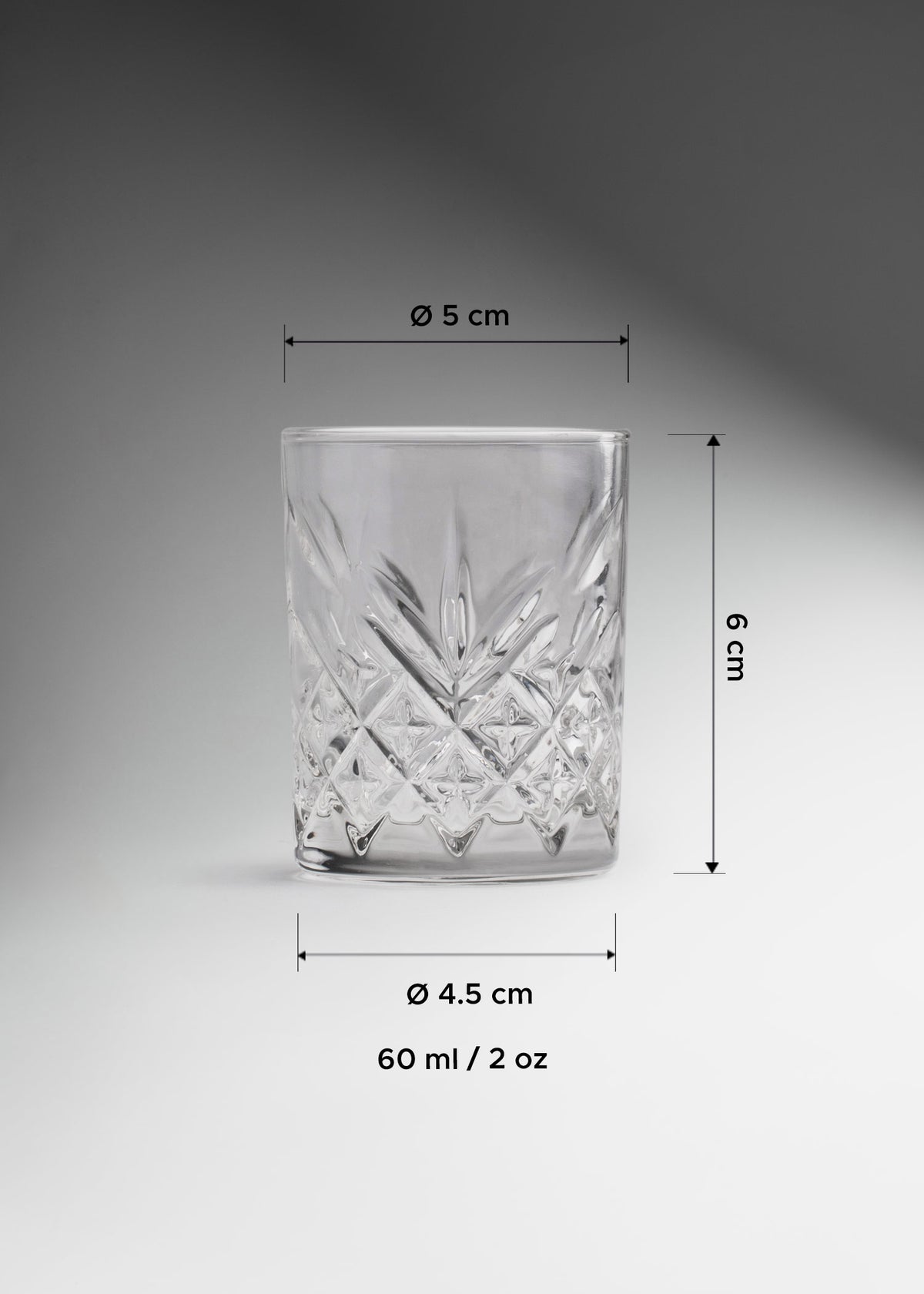 Vaso tequilero de vidrio transparente Infinity 60 ml — imagen de producto